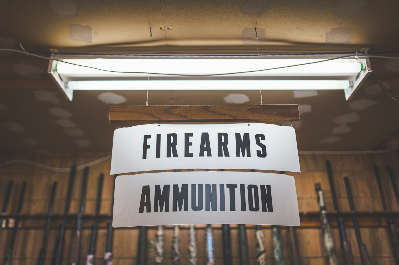 a sign that is hanging from a ceiling