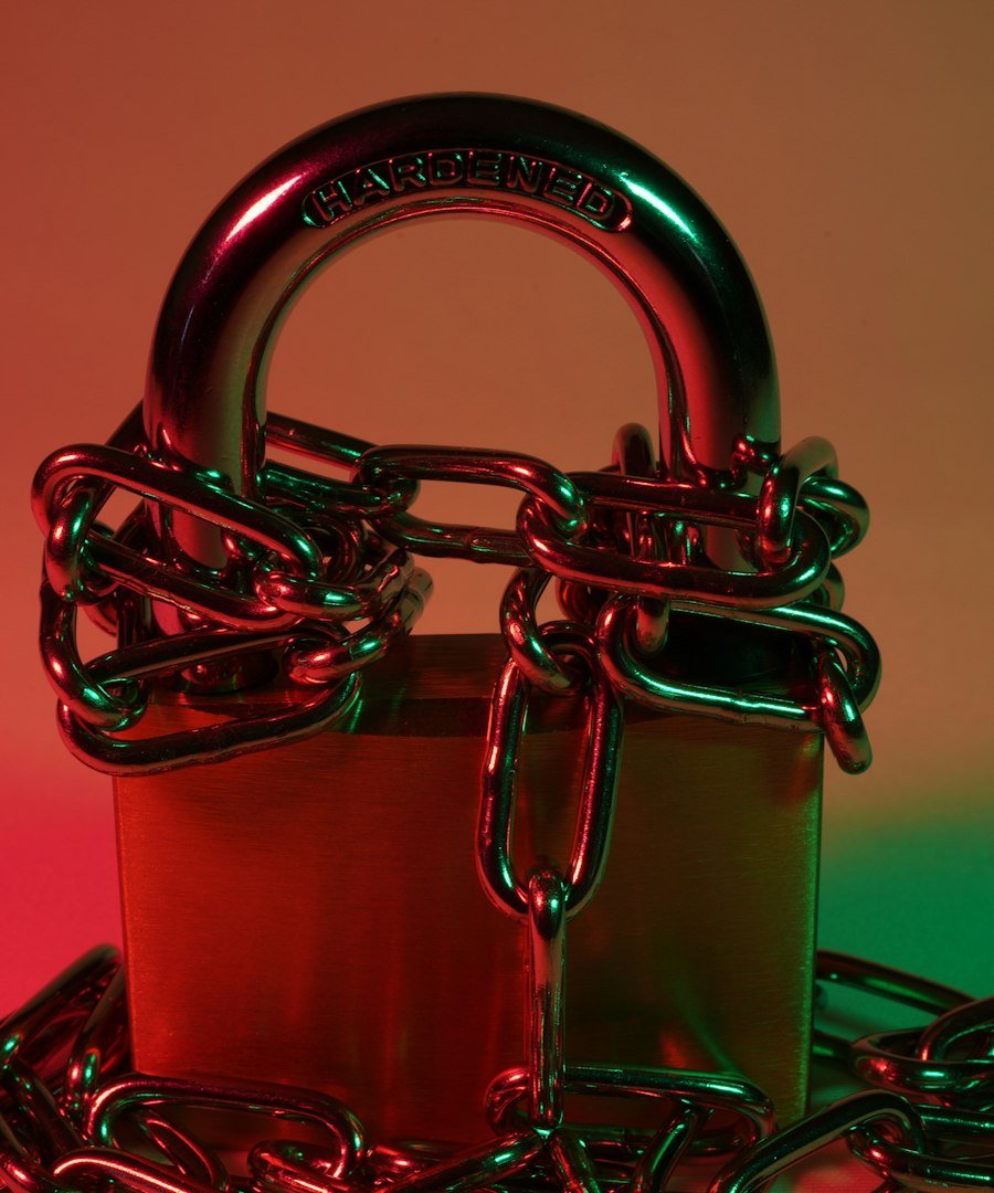 red padlock on red metal chain
